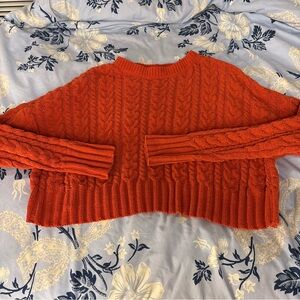Orange cable knit cropped sweater